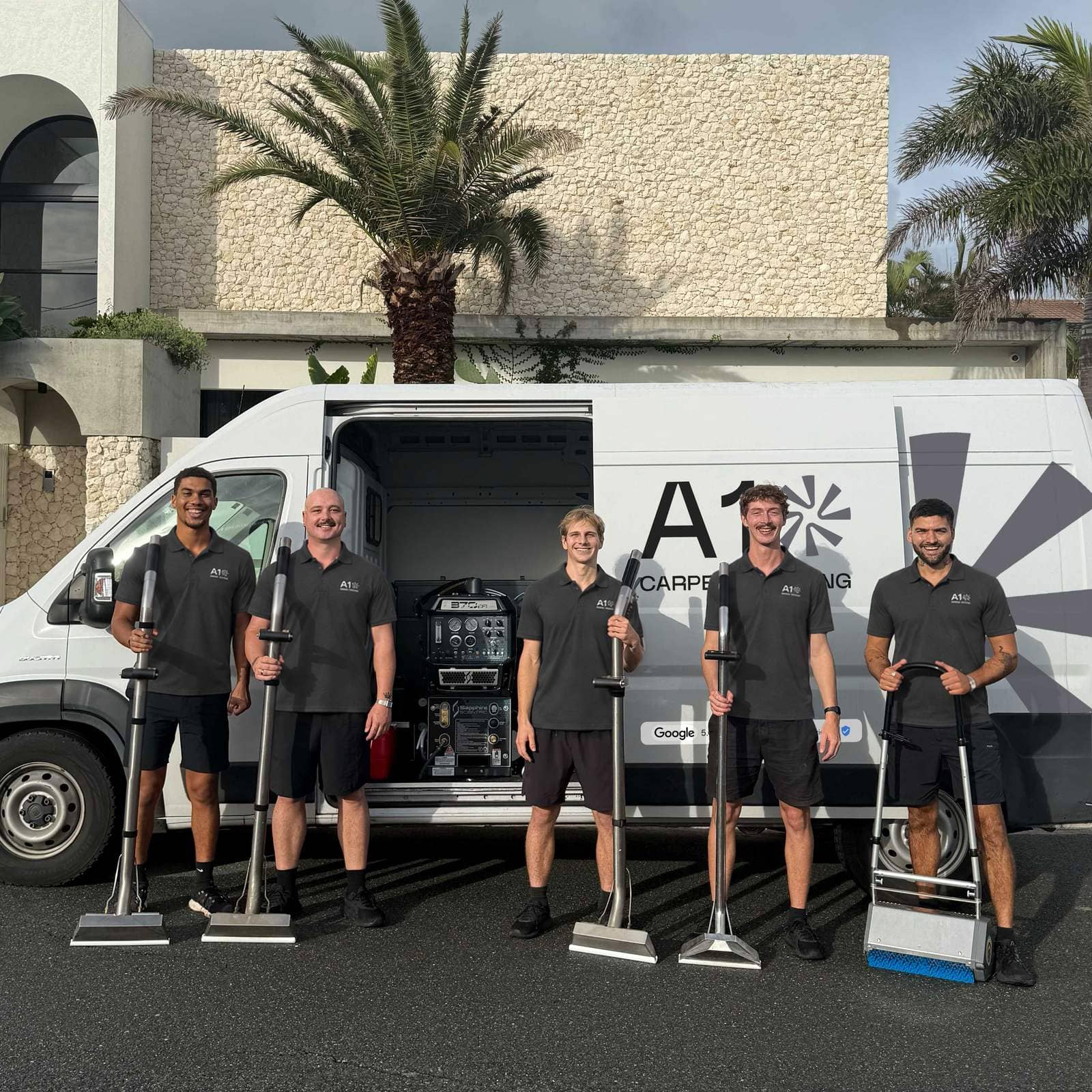 The A1 Carpet Cleaning team with their truck-mounted van on the Sunshine Coast